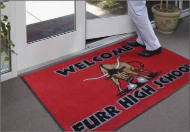 Commercial main entrance floor mats trap dirt, water,  slush and snow